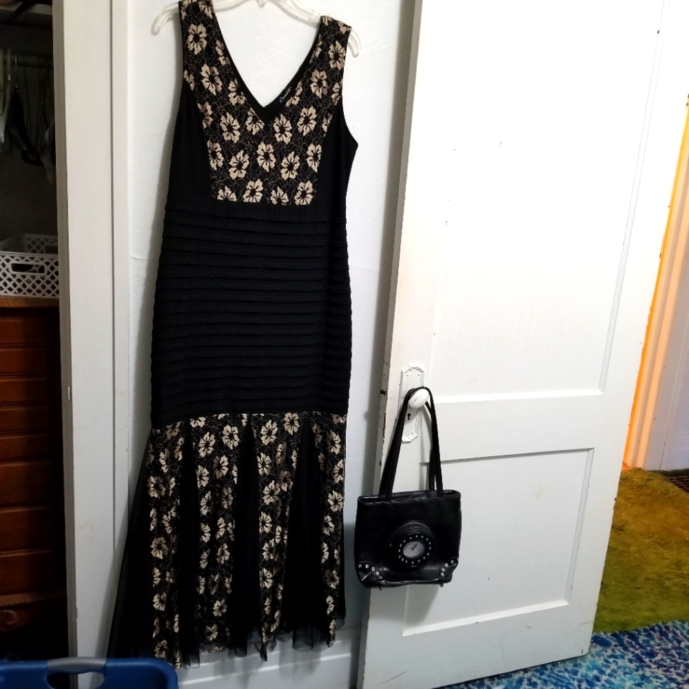 Mermaid long gown.Candalite gold and black,very flattering to the figure.